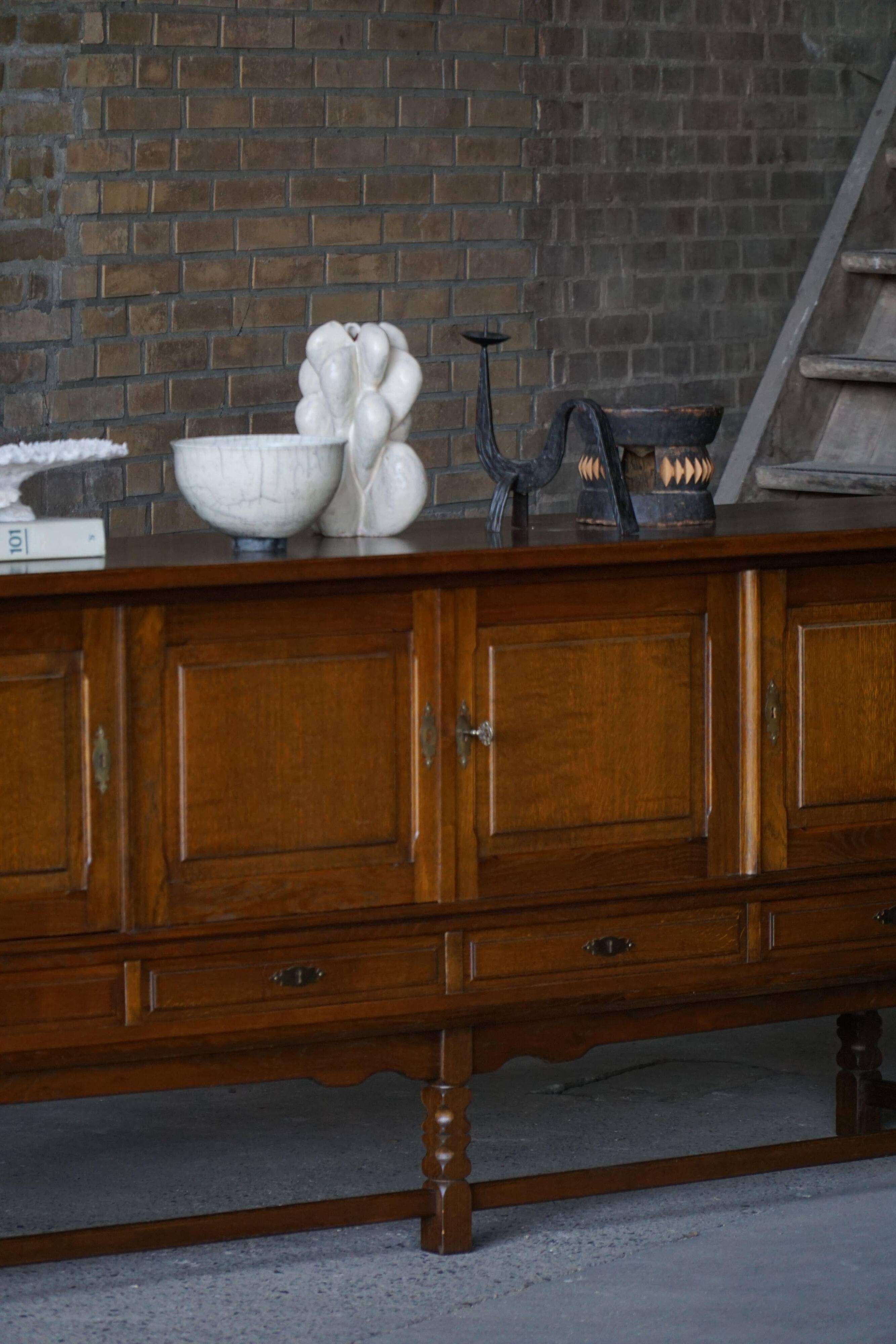 Danish enfilade from the mid-modern century in dark stained oak, 1960s.