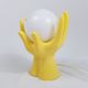 Lamp 2 hands holding a globe ceramic 70