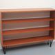 1960s book shelf in walnut, white back panel