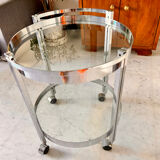 Vintage round dessert trolley in chrome steel, with two glass shelves.
