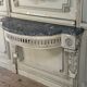 Louis XVI wall console in carved wood, grey patina, 18th century.