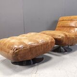 Vintage leather swivel chair with stool, 1970s