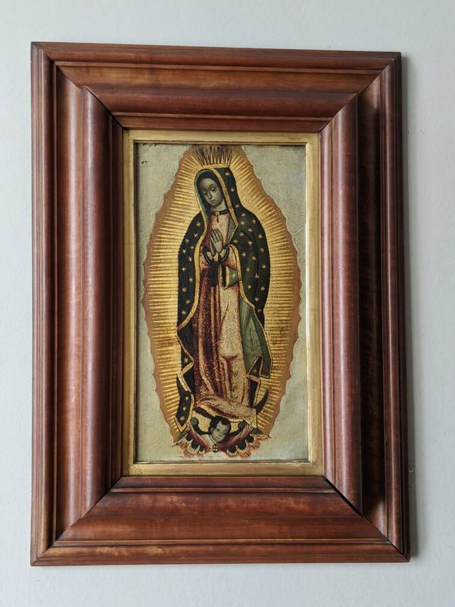 Religious tableau of the Virgin, painting on metal with a handcrafted wooden frame.