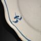 Old plate in Northern earthenware with blue floral decoration eighteenth century