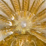 Murano glass scallop bowl in Italy with gold glitter trim