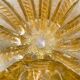 Murano glass scallop shell bowl from Italy with gold glitter trim.