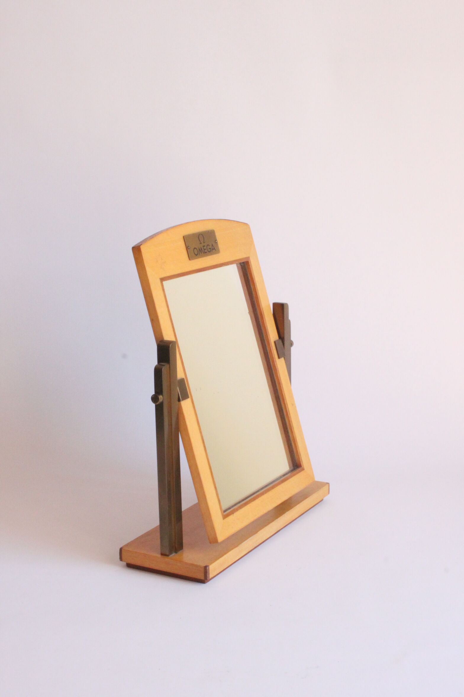 Omega dealers boutique mirror, Switzerland 1940s.