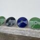 4 green, black and blue enamelled sheet metal suspensions