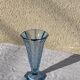 Blue molded glass vase in art deco relief