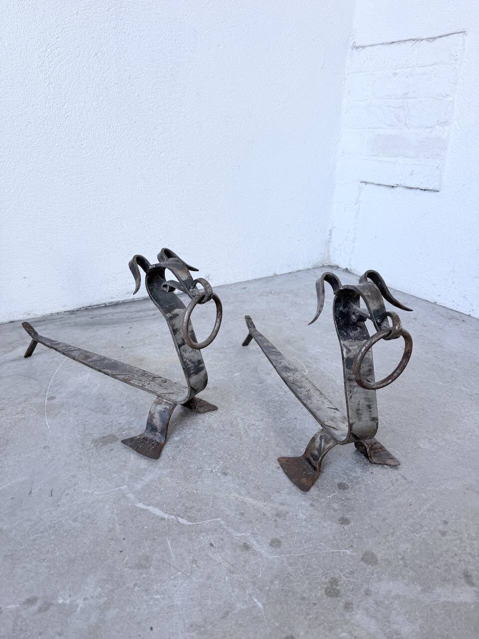 Pair of zoomorphic metal andirons "dogs" 1950