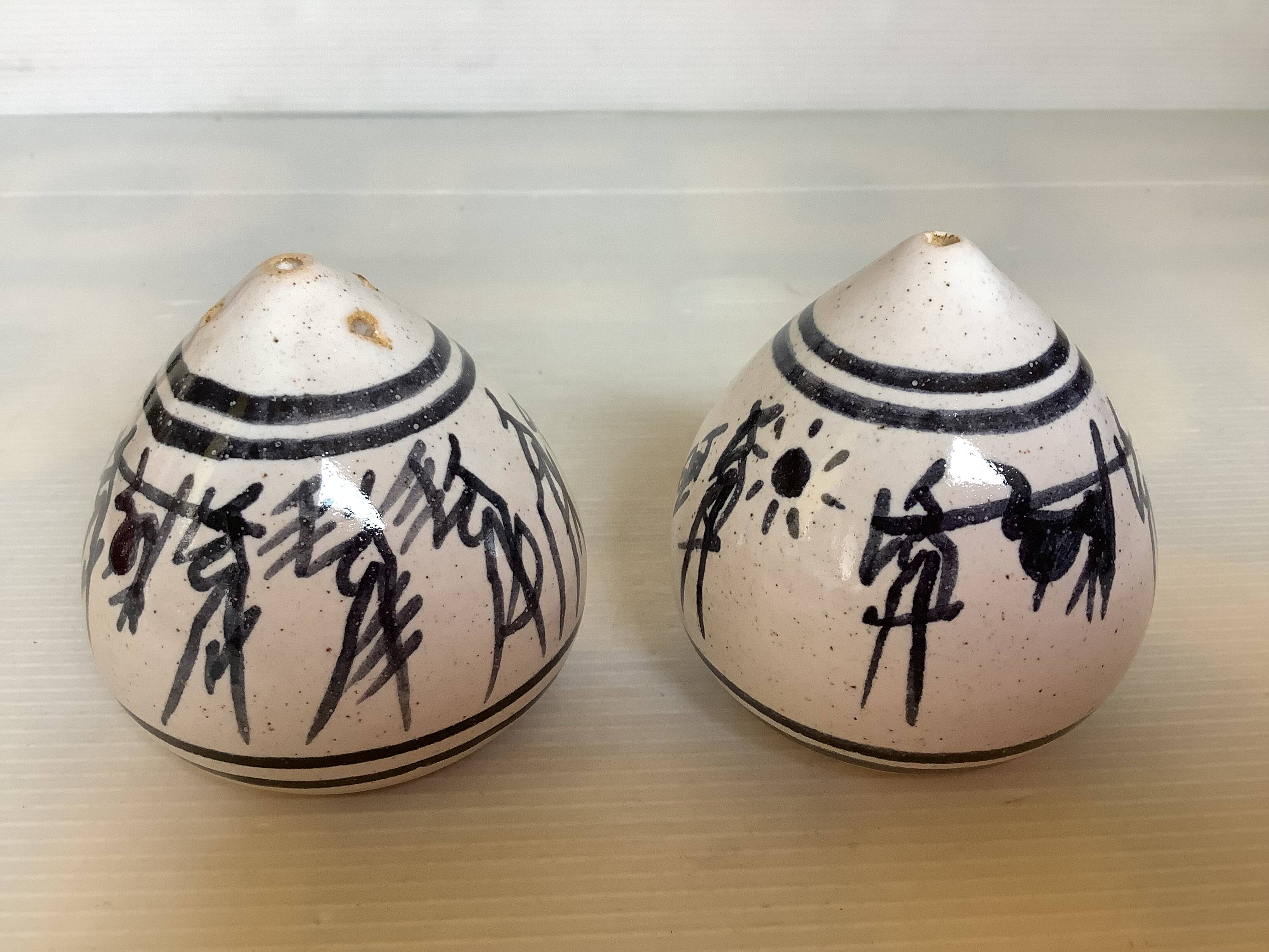 Hand-decorated ceramic salt and pepper shakers