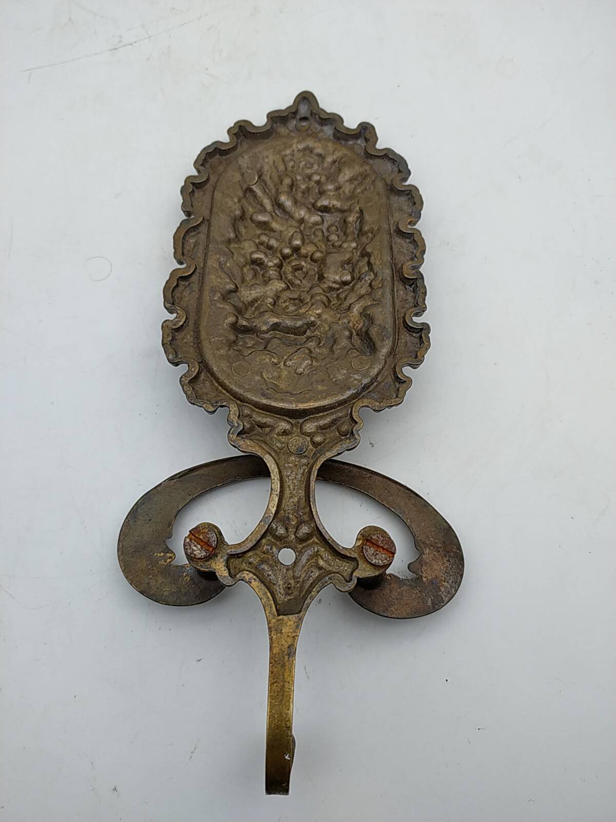 Brass coat rack with floral decoration