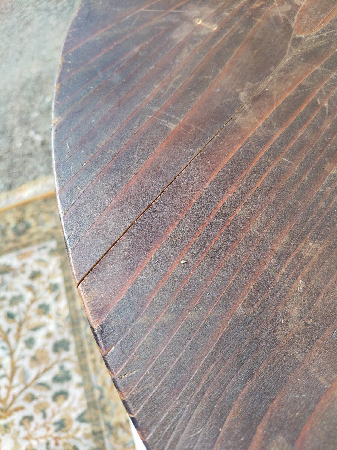 Small rustic antique tripod side table made of solid wood.