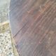 Small rustic antique tripod side table made of solid wood.
