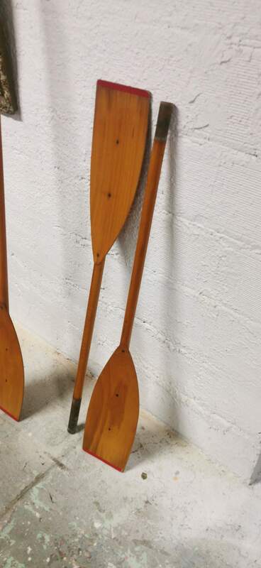 Pair of old wooden oars