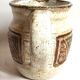 Stoneware pitcher stamped Giraud. Height 18.5 cm