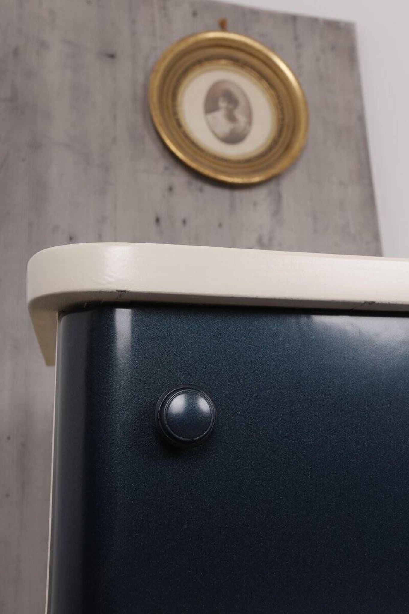 Art Deco bedside table from Hungary, 1930, made of navy blue and cream painted wood.