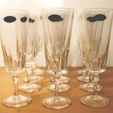 Ensemble de 12 flûtes à champagne, modèle “Versailles”, Cristal d’arques, 70’s.