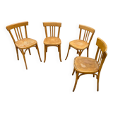 Curved varnished bistro chairs
