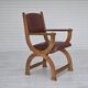 Années 1950, design danois, fauteuil retapissé, cuir marron naturel, bois de chêne.