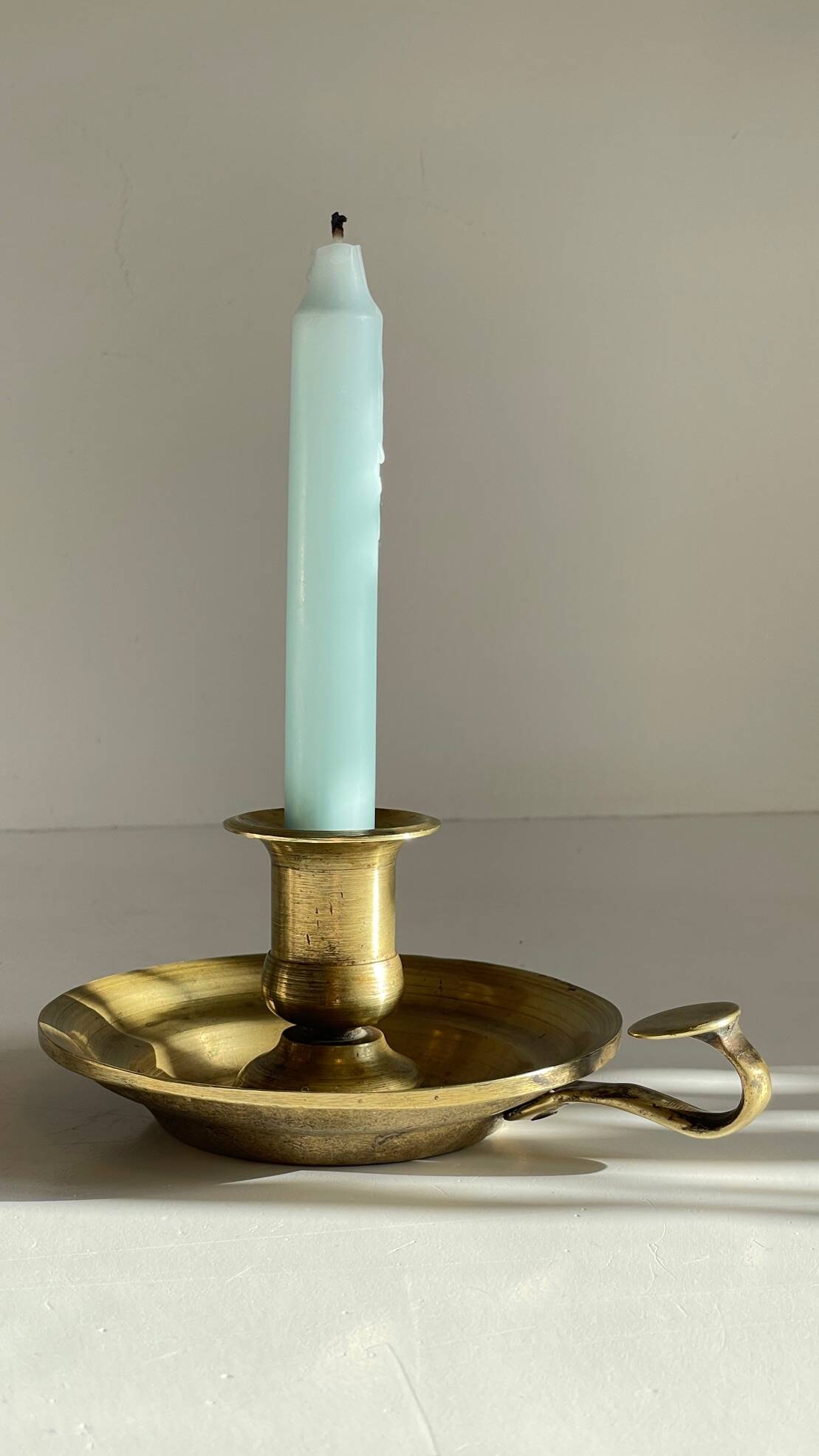 Antique solid bronze hand candlestick