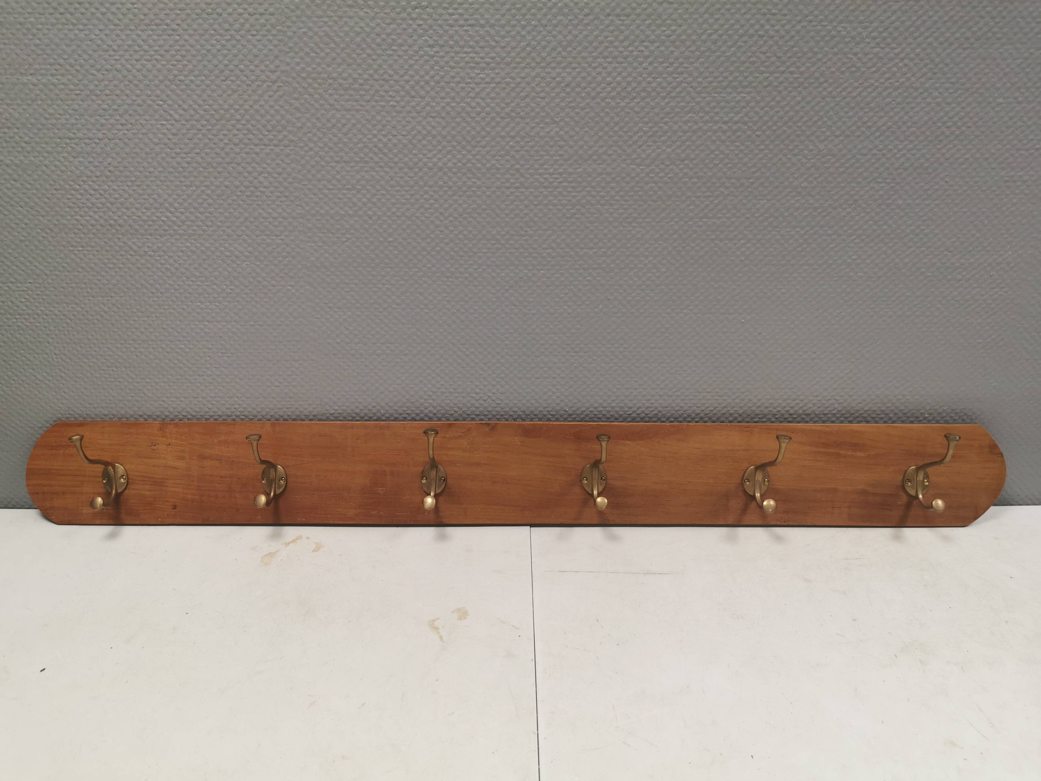 Coat rack in teak and brass. Denmark 1970-80s