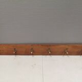 Coat rack in teak and brass. Denmark 1970-80s
