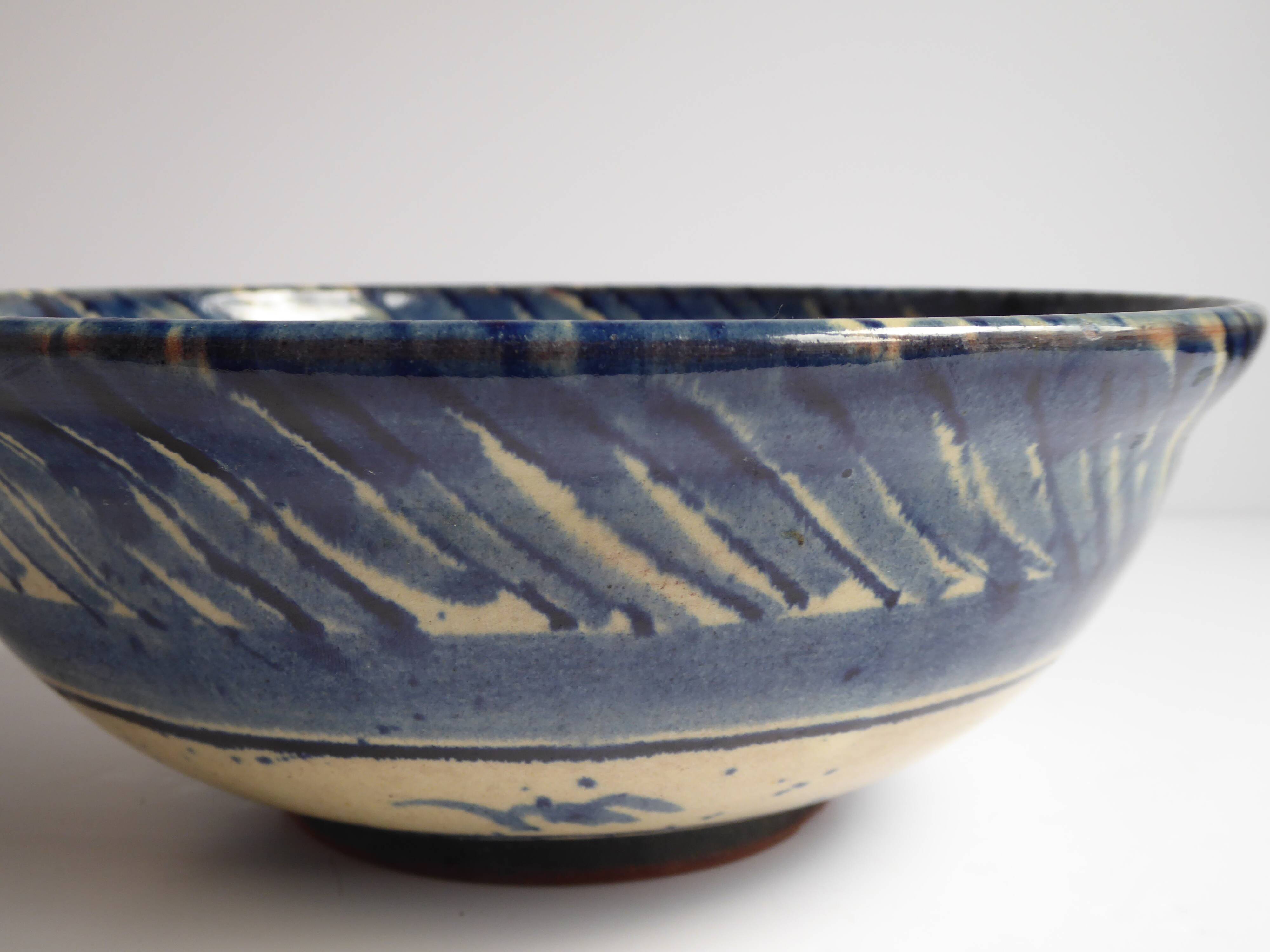 Blue enamelled terracotta cup