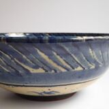 Blue enamelled terracotta cup