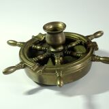 1960s solid brass ashtray in the shape of a steering wheel with a candle stick, vintage