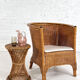 Pair of cabriolet armchairs in wicker and black edging