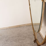 Oval mirror in art deco brass, Italy 1940s.