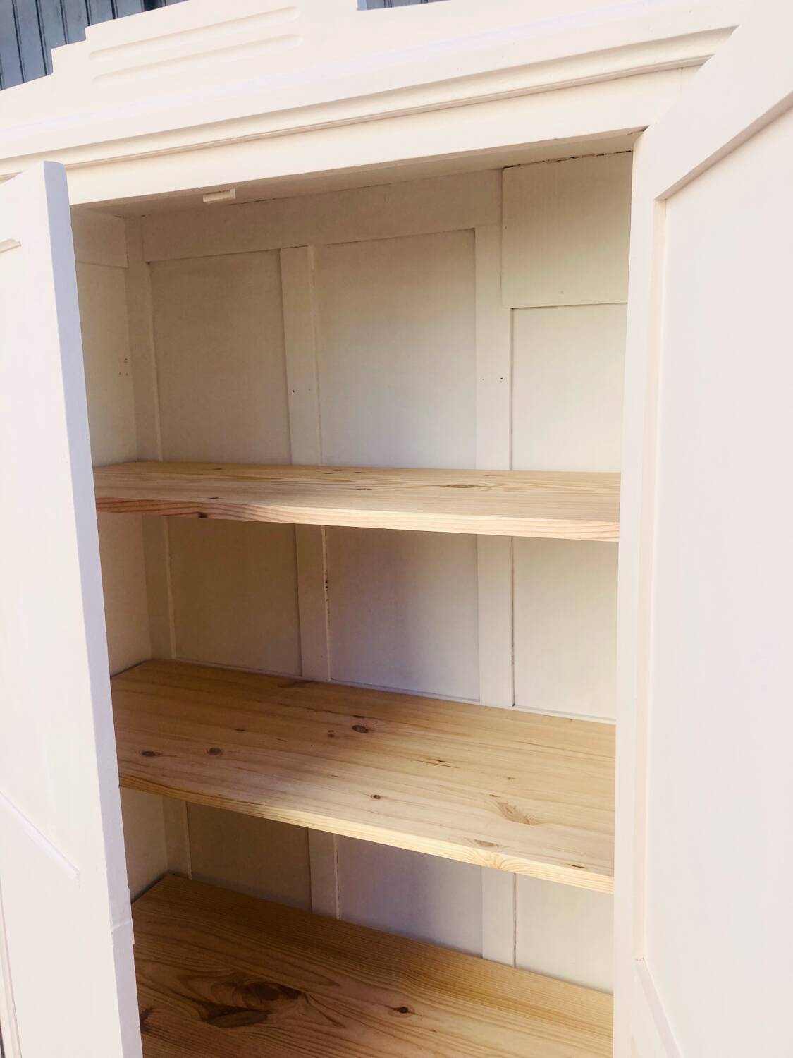 Small powder pink Parisian wardrobe