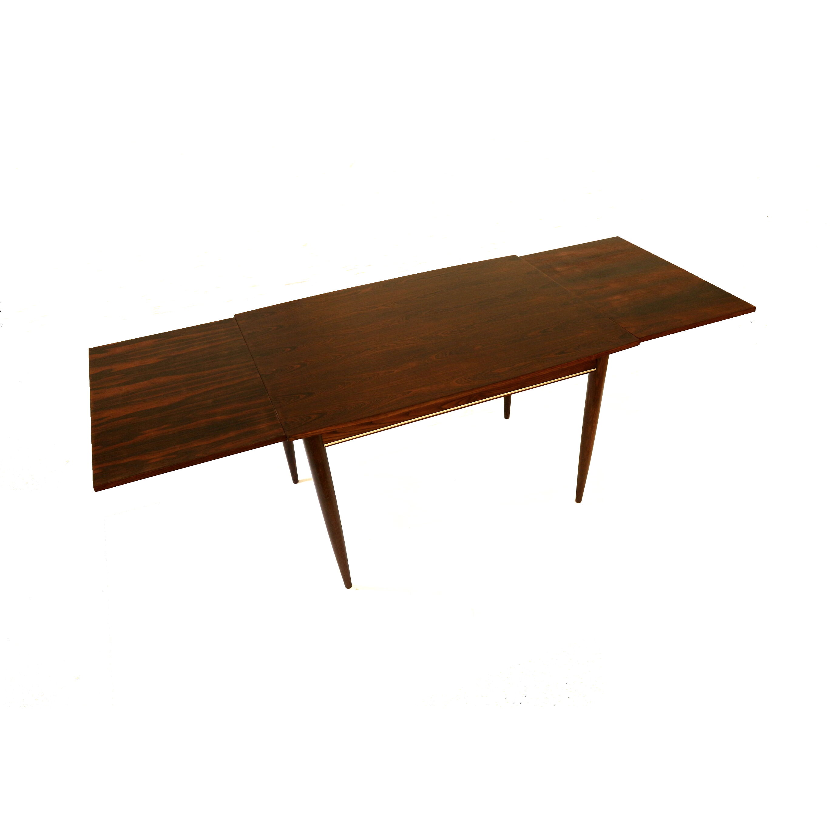 Extendable rosewood dining table made in the 1960s