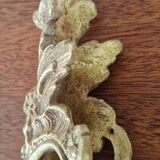 Antique bronze ornaments and pediment