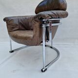 Leather armchair with tubular chrome frame, 1980s