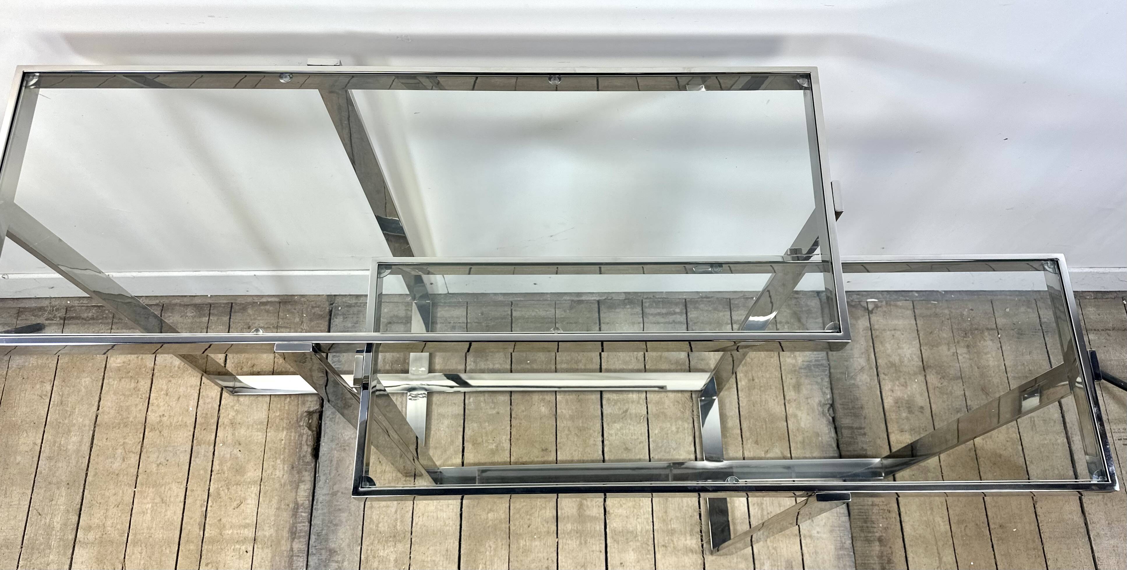 Chrome metal and glass console from the 2000s.