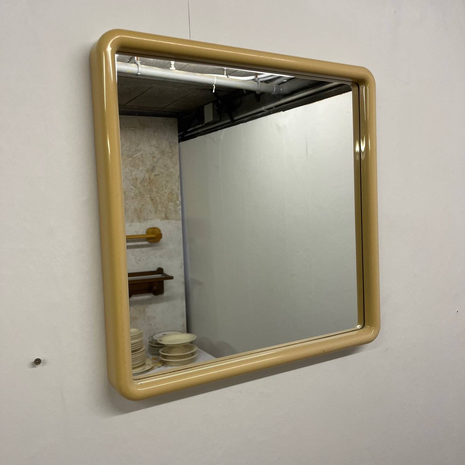 Square plastic mirror with rounded edges, cream, 1970s/80s.