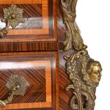 Tomb-shaped commode in Louis XV style with decoration featuring Spanish figures.