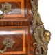 Tomb-shaped commode in Louis XV style with decoration featuring Spanish figures.