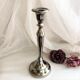 Chromed metal candle holder