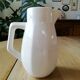 White porcelain milk pot