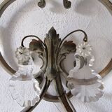 Pair of sconces in patinated metal and crystal tassels