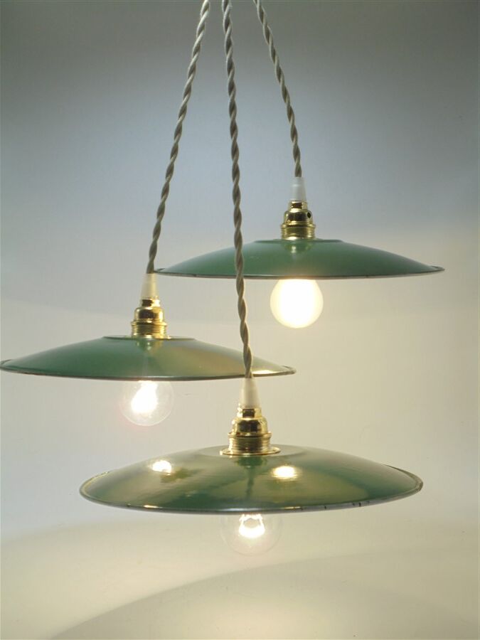 Trio of enamelled sheet metal suspensions