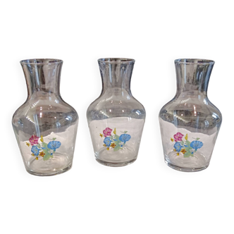 3 glass carafes, vintage. Very pretty floral pattern.