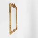 Highly decorated gilted carved wooden wall mirror, Belgium ca. 1950