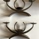 Pair of modernist candlesticks in beaten iron 1970