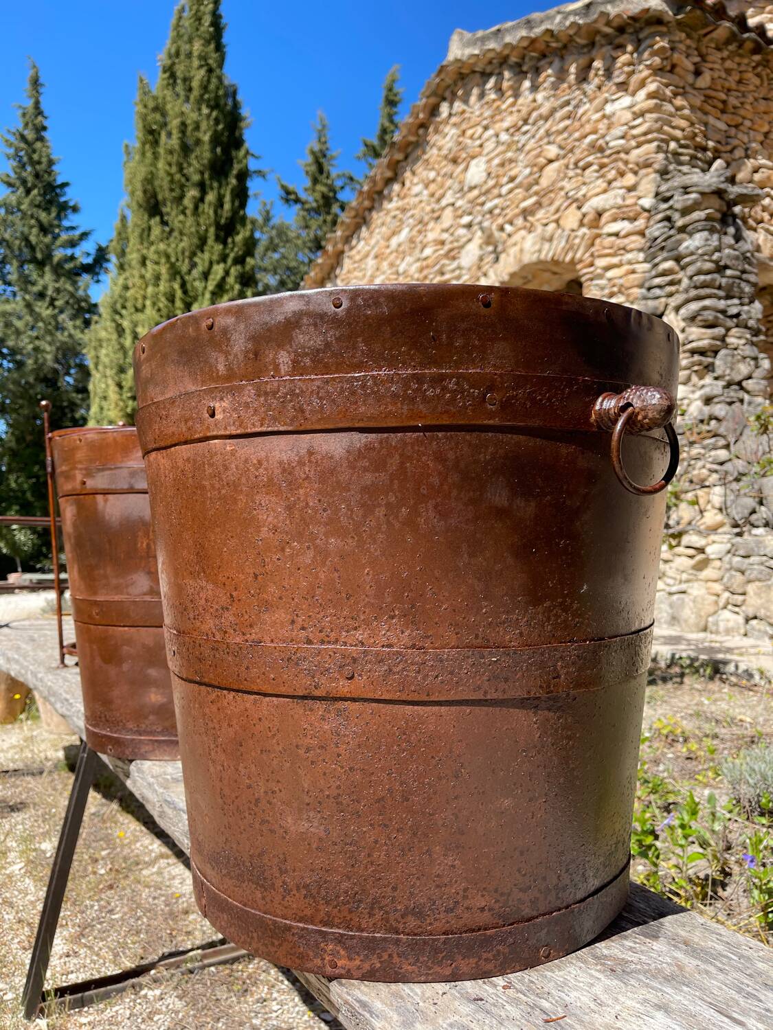 Riveted iron cache pots