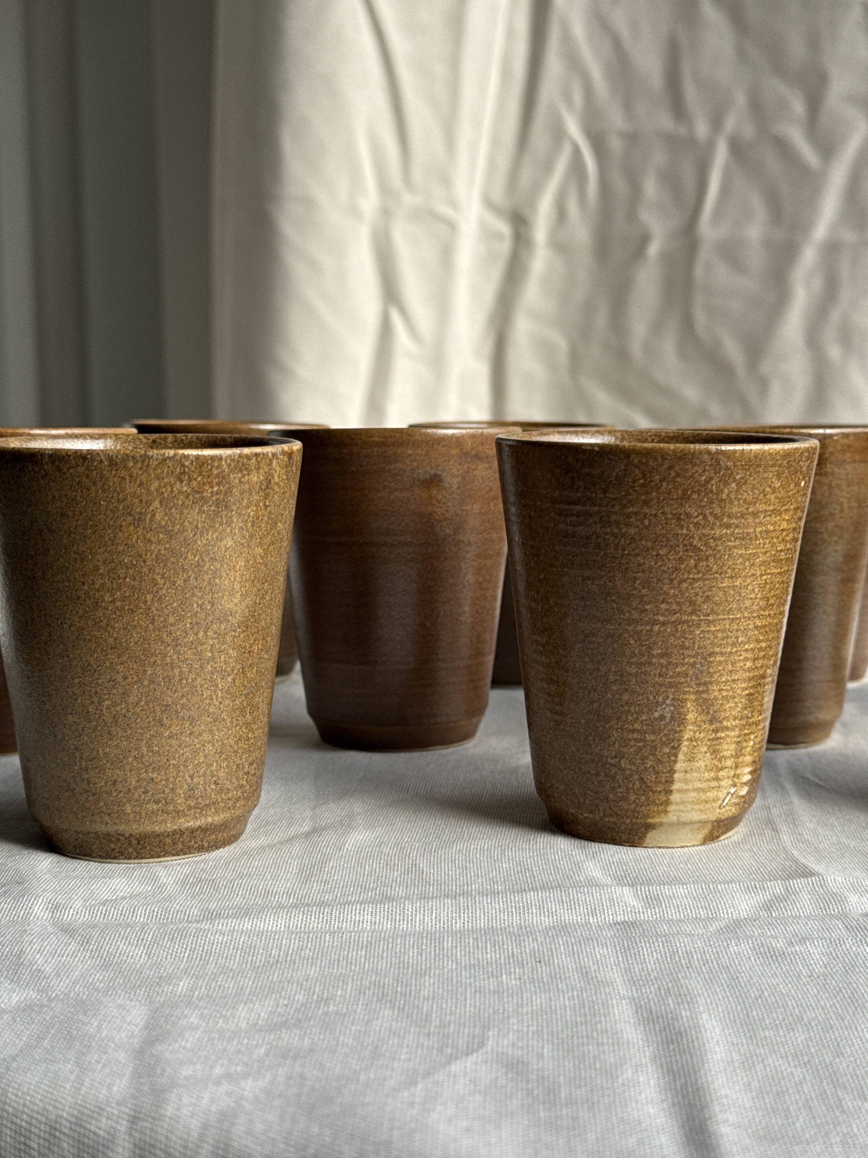 Set of 10 small stoneware mugs from Digoin.