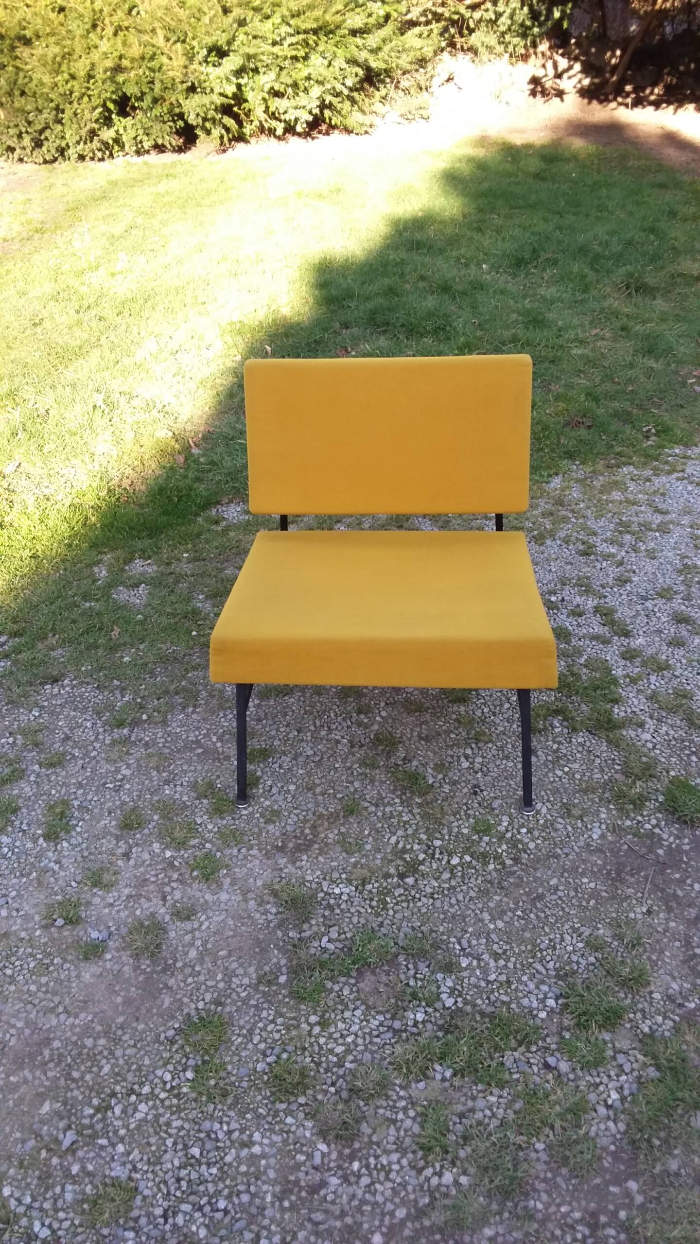 Vintage 50s armchair with black metal base and fabric seats